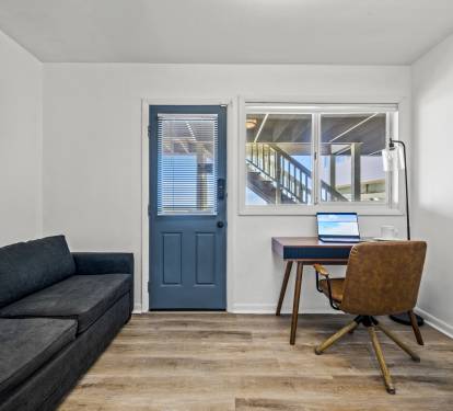 The office also features a full size sleeper sofa and smart TV.