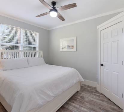 Second bedroom with king bed in the main house