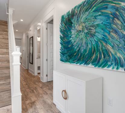 Entrance to Blissful Stay 30A- Up stairs 2 king bedrooms both with ensuite bathrooms - Main Level: first door on right queen room with ensuite bathroom, bathroom, king bedroom then the living room.
