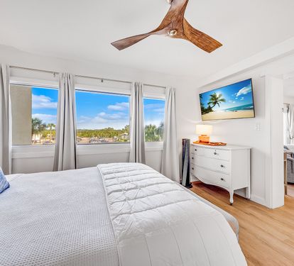 Downstairs Bedroom with Queen Bed and Custom Built-in Bunkbeds