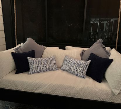 Cozy bed swing with linens