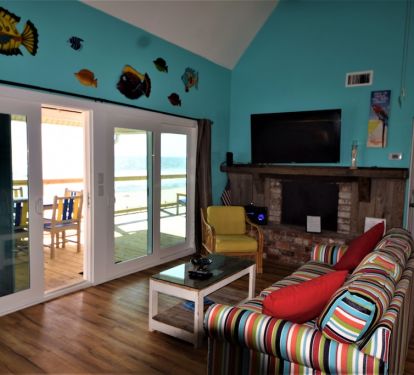 Living Room with beach view (gas fireplace in serv