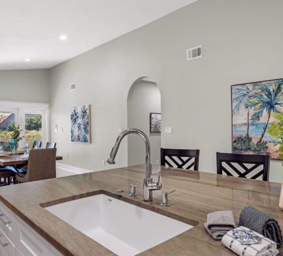 Kitchen is right in the middle of the home