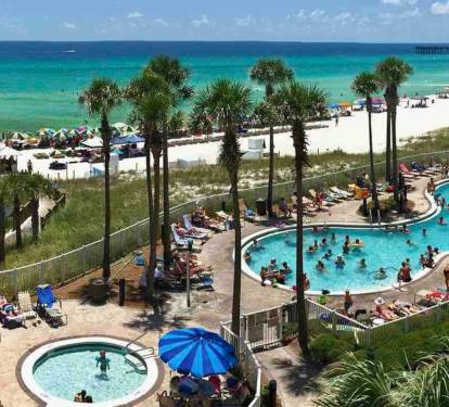 Beachfront resort with pool, Kiddy pool, hot tub and tiki bar on site! 