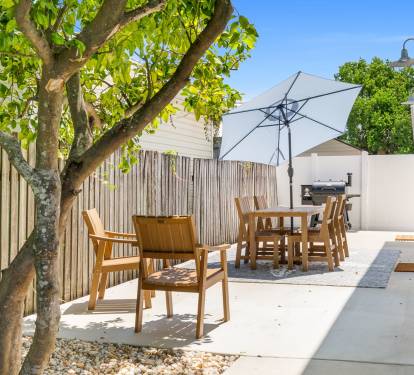 The gorgeous side yard allows you to experience the outdoors without having to leave the property.