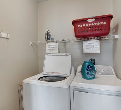 Laundry area with full-size washer and dryer