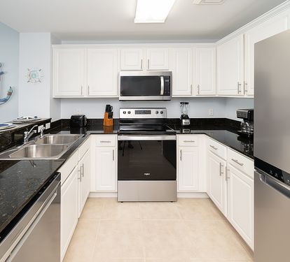 Kitchen with new stainless steel appliances