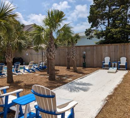 Challenge friends to a game of cornhole while soaking in the laid-back charm of your private tropical oasis.