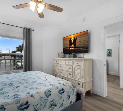 Primary bedroom with TV
