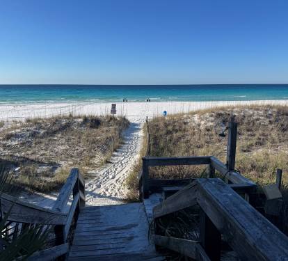 Path to the beach, with a shower to wash off when you are done! 

The beachfront across all of Destin was renourished so as long as you stay within 30 feet from water you can enjoy. No tents or canopies are allowed!