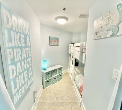 Bunkroom with TVs and Door