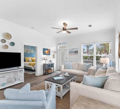 After a day at the beach, enjoy our comfortable new sofas and 55" TV.