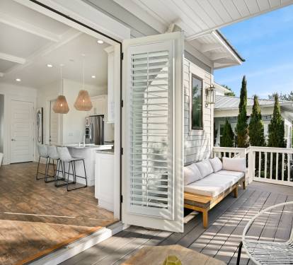 The patio door opens wide for true indoor outdoor living.