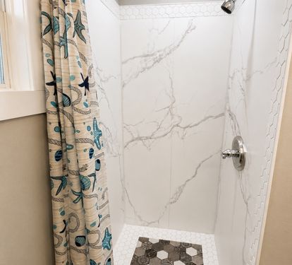 Shower in full bathroom