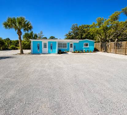 This home offers plenty of parking for cars, boats, trailers and RV's 
