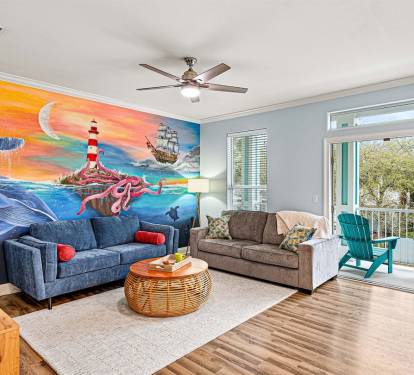 The living room mural sets the tone — welcome to paradise