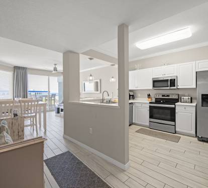 Open kitchen, dining & living area designed for easy time together.