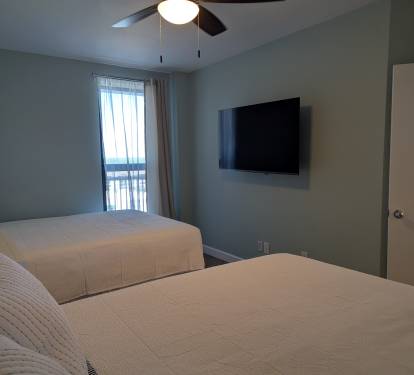 55" Roku TV in the dual queen bedroom