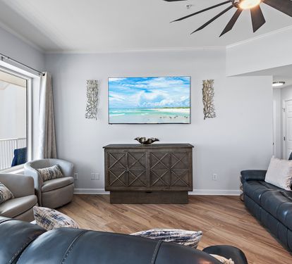 Living room with plush seating and Smart TV