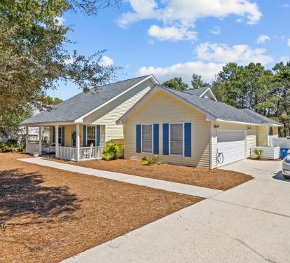 Spacious driveway and overflow parking makes arrival stress free- perfect for large families and a rare find in Inlet Beach. Tesla Level 2 charger available. 