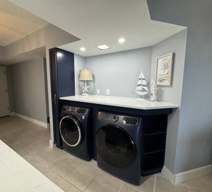 New addition to the Coastal Kitchen is a build in laundry area featuring brand new GE large capacity high efficiency Smart washer and dryer.
