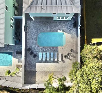 Pool and lounge chairs in backyard