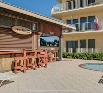 Tiki Hut providing food and beverages -small wading pool for the kids and gated.