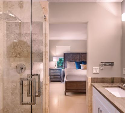 Primary bath/ en suite with rain shower head and removable shower head
