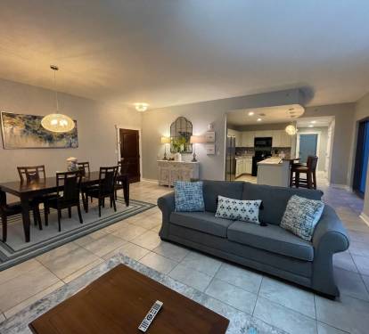 Living room showing the size of the unit. At 1900 sqft, it's one of the larger condos in PCB. plenty of room for 12 guests
