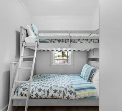 Twin over full bunk beds in the second bedroom