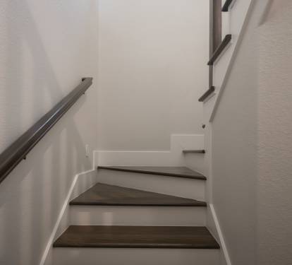 Simple hallway detail creating a clean, uncluttered transition between rooms.
