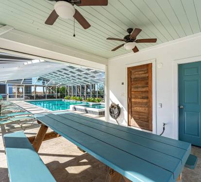 Covered Picnic Table and Bathroom Located in the Pool House