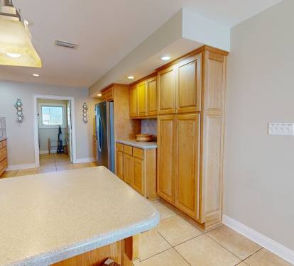 Kitchen with pantry and plentiful counter space