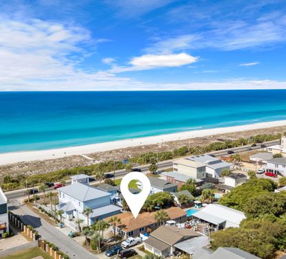 You're just a short stroll from the Gulf. This aerial shows exactly how close Salt & Sway sits to white-sand beach access, with turquoise water visible from your own backyard.