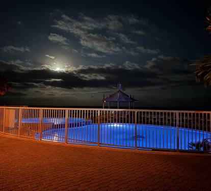 An evening dip in the outdoor pool can be a joy.