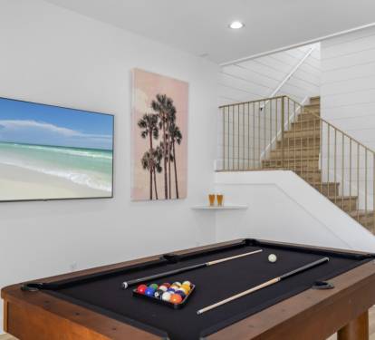 Stylish game room showcasing a high-end pool table.
