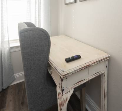 Dedicated desk nook perfect for remote work or planning the day.