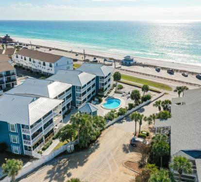Breathtaking Beachfront: An Aerial Perspective of Your Next Vacation Destination Hosted by Blissful Vacation Stays 