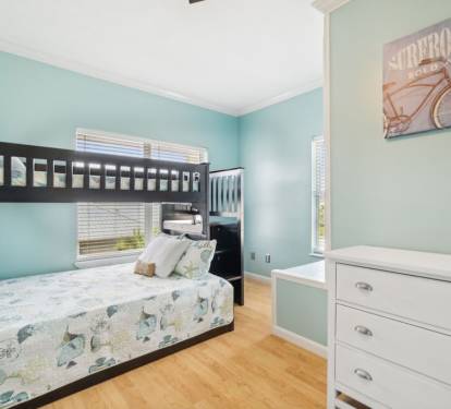 A third bedroom on the 2nd level of the home includes a bunk bed with a twin over full. There is also a twin pull out trundle.