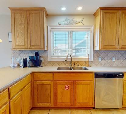 Kitchen sink with views of the beach