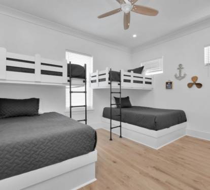 Bunk room with 2 queen size and 2 twin beds