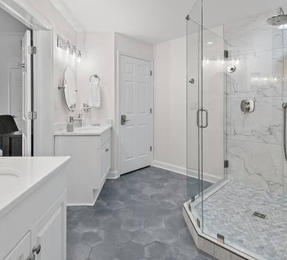Primary bath with dual sinks and large walk in shower