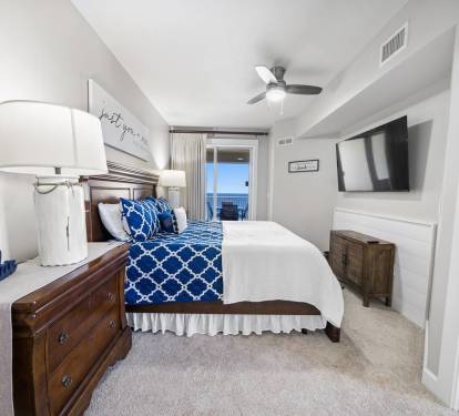 Wake up in our master bedroom to a beautiful view of the ocean with your own entrance to the patio! 
