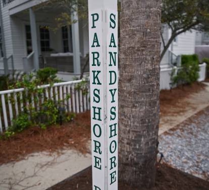 At the corner of Parkshore & Sandyshore.