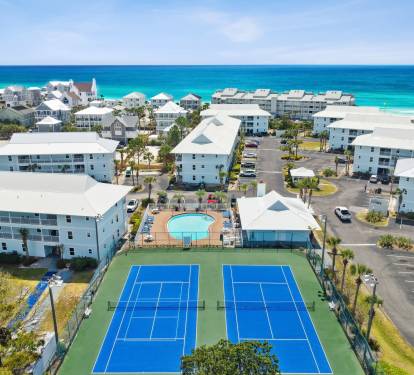 Overview of tennis courts and swimming pool