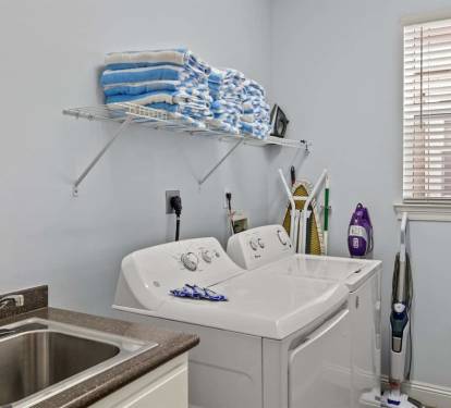A full laundry room on the first floor and we supply the pool and beach towels. Pack less, enjoy more.