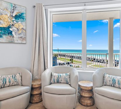 Open-concept living area with direct balcony access
