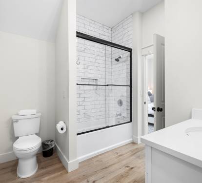 1st floor bathroom one has a tub/ shower combo