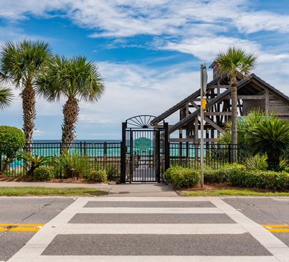 Private beach access gate for Emerald Shores guests