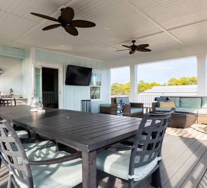 3rd Floor Patio with grill, large dining table, smart TV, large sectional, and firepit
